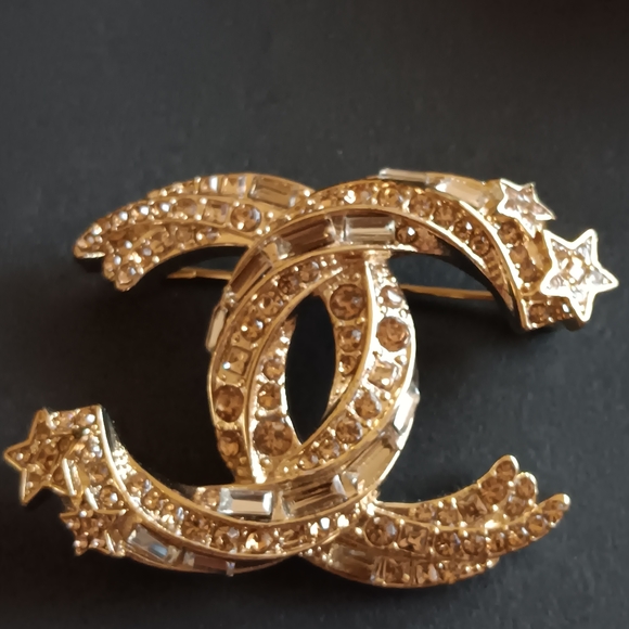 Chanel Gold Crystal Brooch So chic and style. This is a must have!!